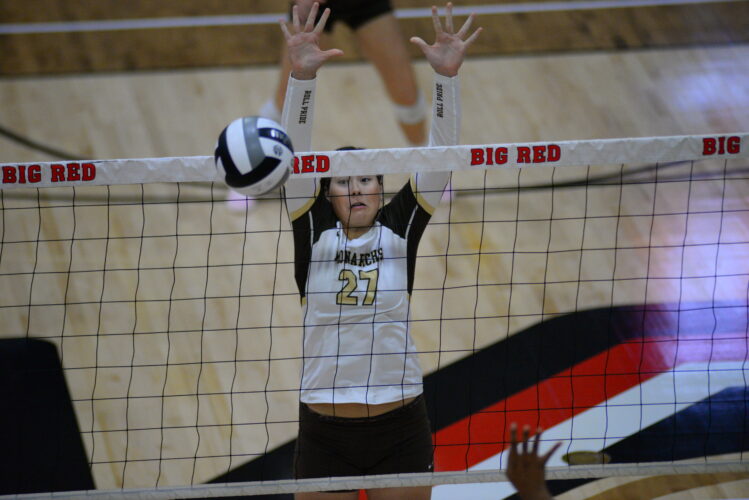 John Marshall Fends Off Big Red In Five